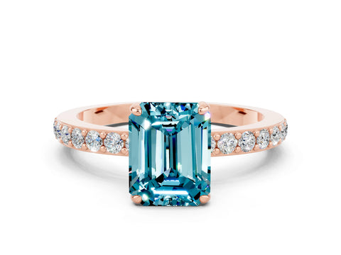 Rose gold Emerald Cut Blue Topaz Ring with Pavé Band and Four-Prong Setting