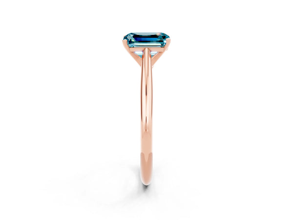 Rose gold Emerald Cut Blue Topaz Solitaire Engagement Ring with Cathedral Setting and Four-Prong Mount