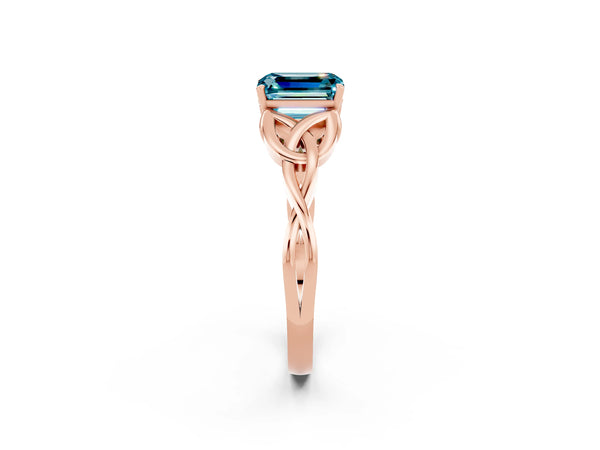 Rose gold Emerald Cut Blue Topaz Solitaire Engagement Ring with Celtic Knot Band and Four-Prong Setting