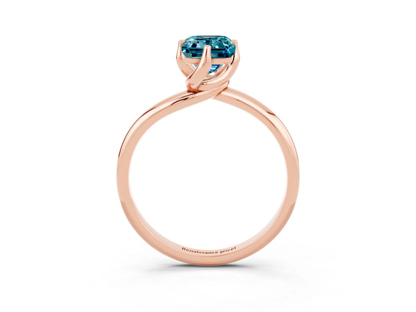 Rose gold Emerald Cut Blue Topaz Solitaire Engagement Ring with Four-Prong Setting and Classic Band