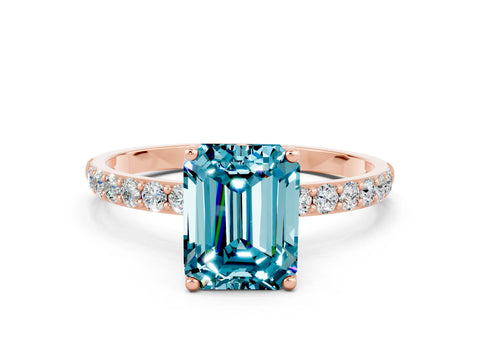 Rose gold Emerald Cut Blue Topaz Solitaire Engagement Ring with Pavé Band and Prong Setting