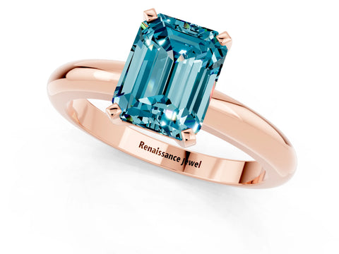 Rose gold Emerald Cut Blue Topaz Solitaire Engagement Ring with Round Band and Four-Prong Setting_1