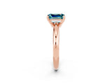 Rose gold Emerald Cut Blue Topaz Solitaire Engagement Ring with Round Band and Four-Prong Setting_2