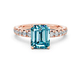 Rose gold Emerald Cut Blue Topaz Solitaire Pavé Engagement Ring with Round Band and Prong Setting_12