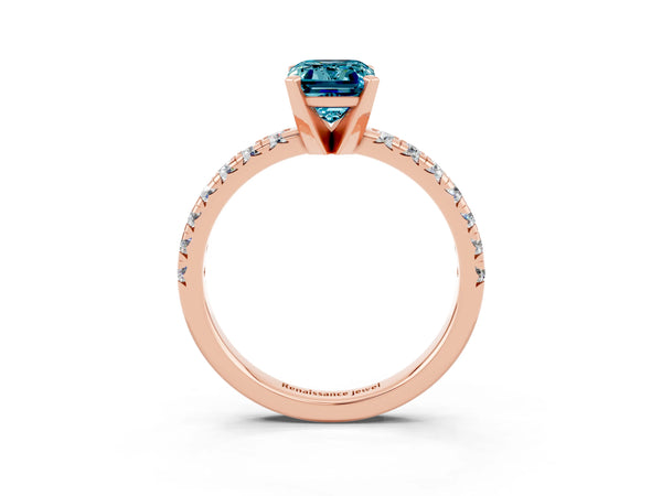 Rose gold Emerald Cut Blue Topaz Solitaire Pavé Engagement Ring with Round Band and Prong Setting