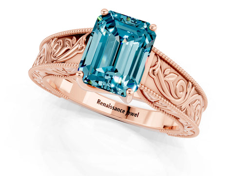 Rose gold Emerald Cut Blue Topaz Solitaire Ring with Engraved Band and Four-Prong Setting_1