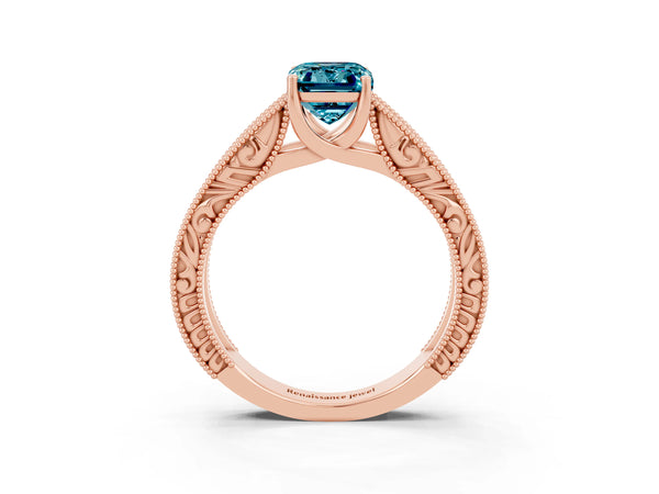 Rose gold Emerald Cut Blue Topaz Solitaire Ring with Engraved Band and Four-Prong Setting