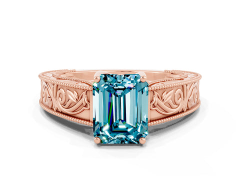 Rose gold Emerald Cut Blue Topaz Solitaire Ring with Engraved Band and Four-Prong Setting