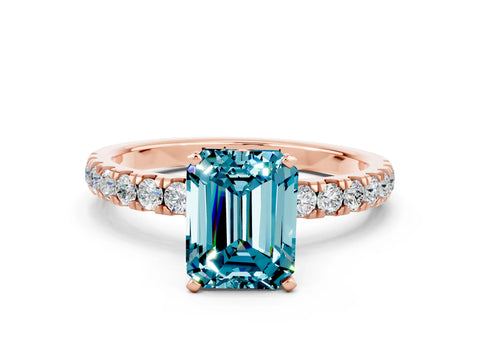 Rose gold Emerald Cut Blue Topaz Solitaire Ring with Pavé Accents and Four-Prong Setting