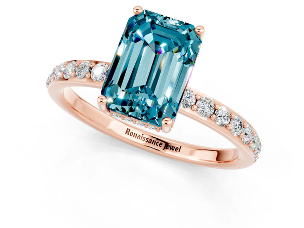 Rose gold Emerald Cut Blue Topaz Solitaire Ring with Pavé Band and Hidden Halo