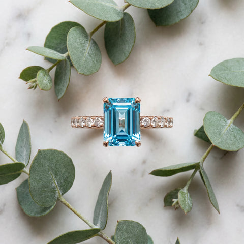 Rose gold Emerald Cut Blue Topaz Solitaire Ring with Round  Pavé Band and Four-Prong Setting_57