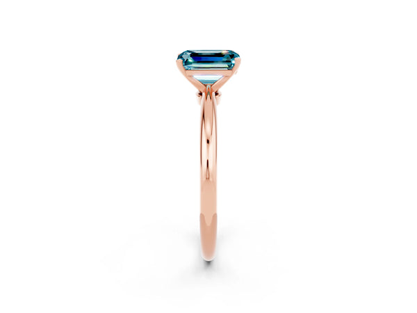 Rose gold Emerald Cut Blue Topaz Solitaire Ring with Six-Prong Setting and Classic Band