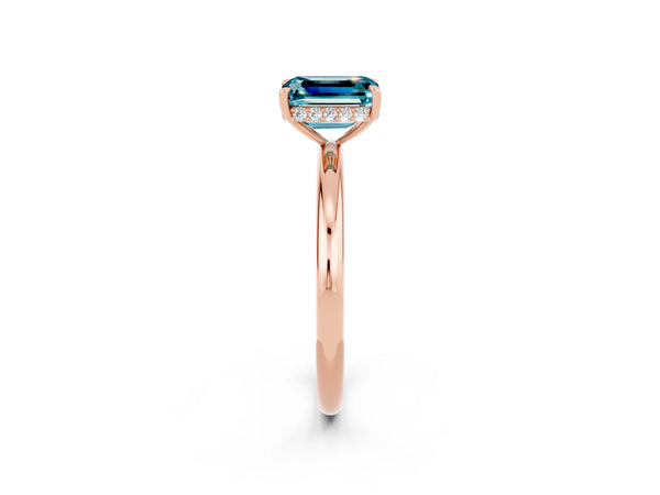 Rose gold Emerald Cut Blue Topaz Solitaire Ring with Thin Band and Four-Prong Setting