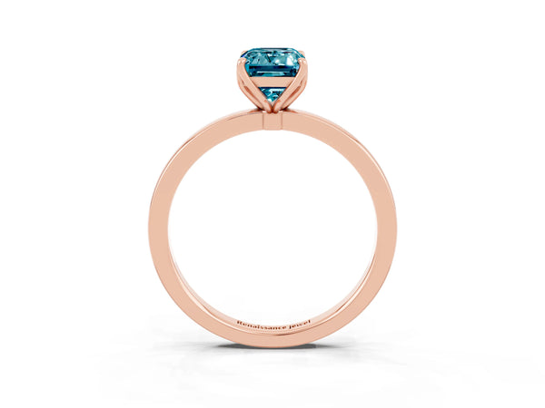 Rose gold Emerald Cut Blue Topaz Solitaire Ring with Thin Band and Prong Setting