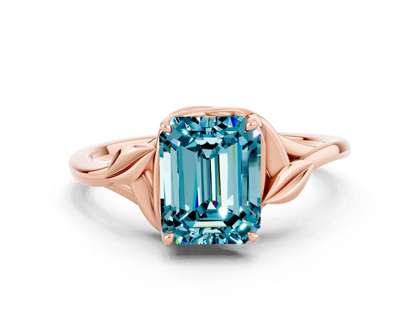 Rose gold Emerald Cut Blue Topaz Solitaire Ring with Twist Band and Four-Prong Setting
