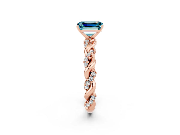 Rose gold Emerald Cut Blue Topaz Solitaire Ring with Twisted Band and Pavé Accents