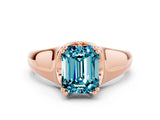 Rose gold Emerald Cut Blue Topaz Solitaire Ring with Wide Band and Prong Setting