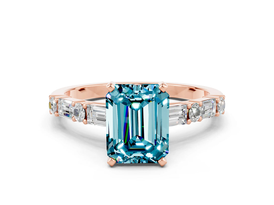 Rose gold Emerald Cut Blue Topaz Solitaire with Side Baguettes and Channel Set Band
