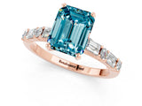 Rose gold Emerald Cut Blue Topaz Solitaire with Side Baguettes and Channel Set Band_1