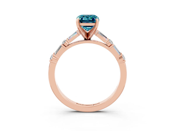 Rose gold Emerald Cut Blue Topaz Solitaire with Side Baguettes and Channel Set Band