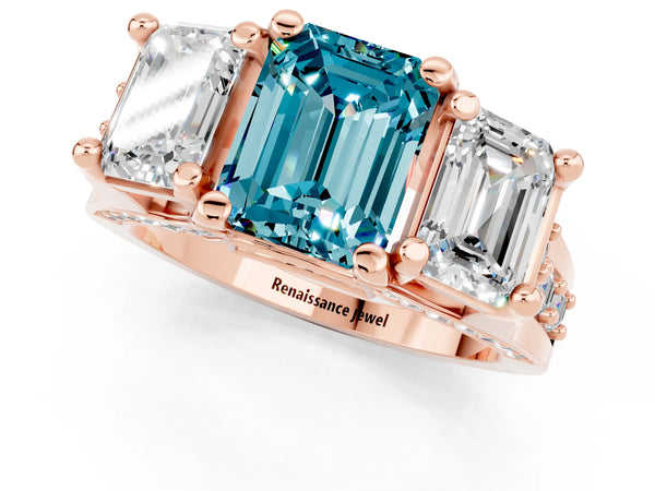 Rose gold Emerald Cut Blue Topaz Three-Stone Ring with Channel Set Band and Four-Prong Setting