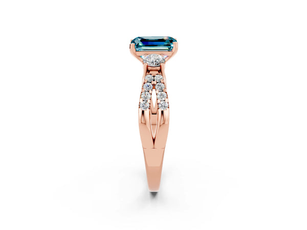 Rose gold Emerald Cut Blue Topaz Three-Stone Ring with Pavé Split Shank and Four-Prong Setting