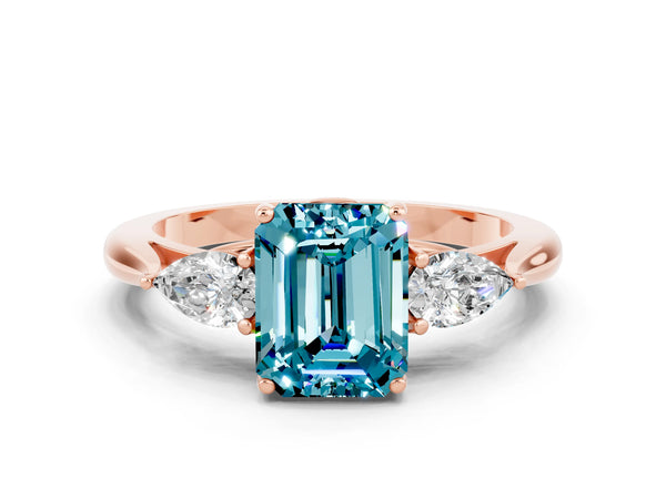 Rose gold Emerald Cut Blue Topaz Three-Stone Ring with Pear  Side Stones and Prong Setting