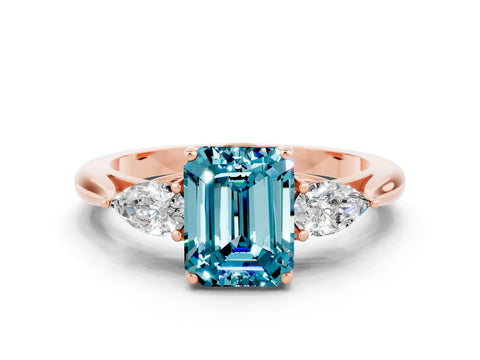Rose gold Emerald Cut Blue Topaz Three-Stone Ring with Pear Side Stones and Four-Prong Setting_12