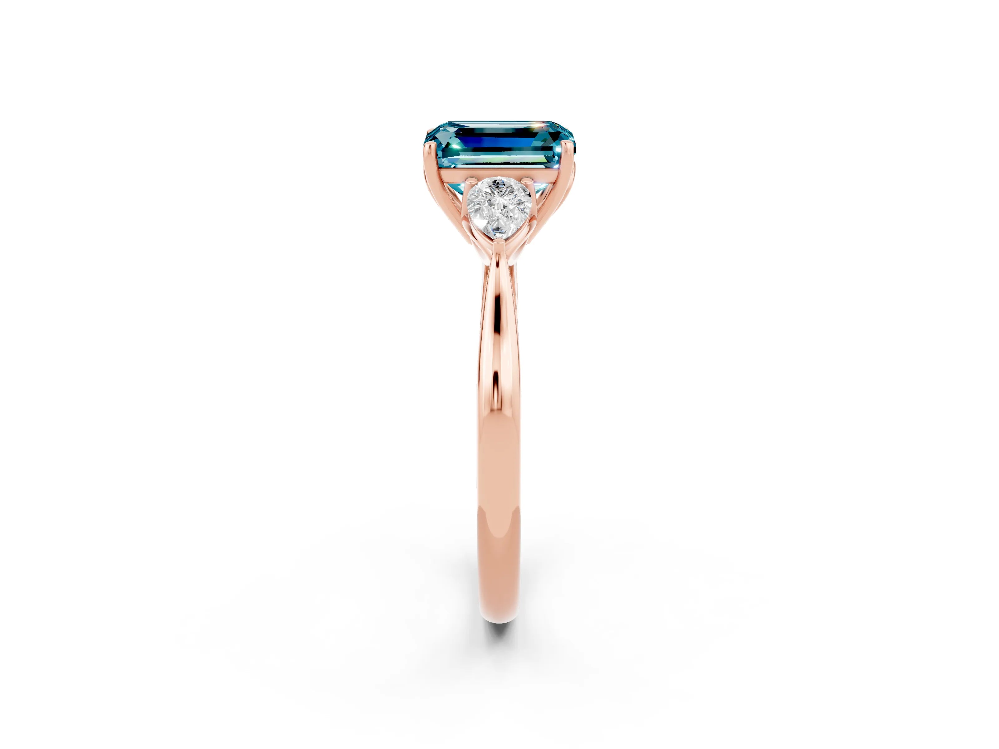 Rose gold Emerald Cut Blue Topaz Three-Stone Ring with Pear Side Stones and Four-Prong Setting_14