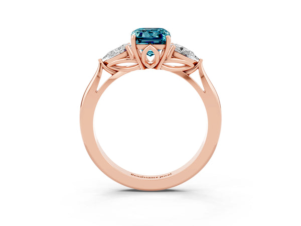 Rose gold Emerald Cut Blue Topaz Three-Stone Ring with Pear  Side Stones and Prong Setting