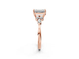 Rose gold Emerald Cut Brilliant Diamond Solitaire Ring with Pear Side Stones and Four-Prong Setting_5