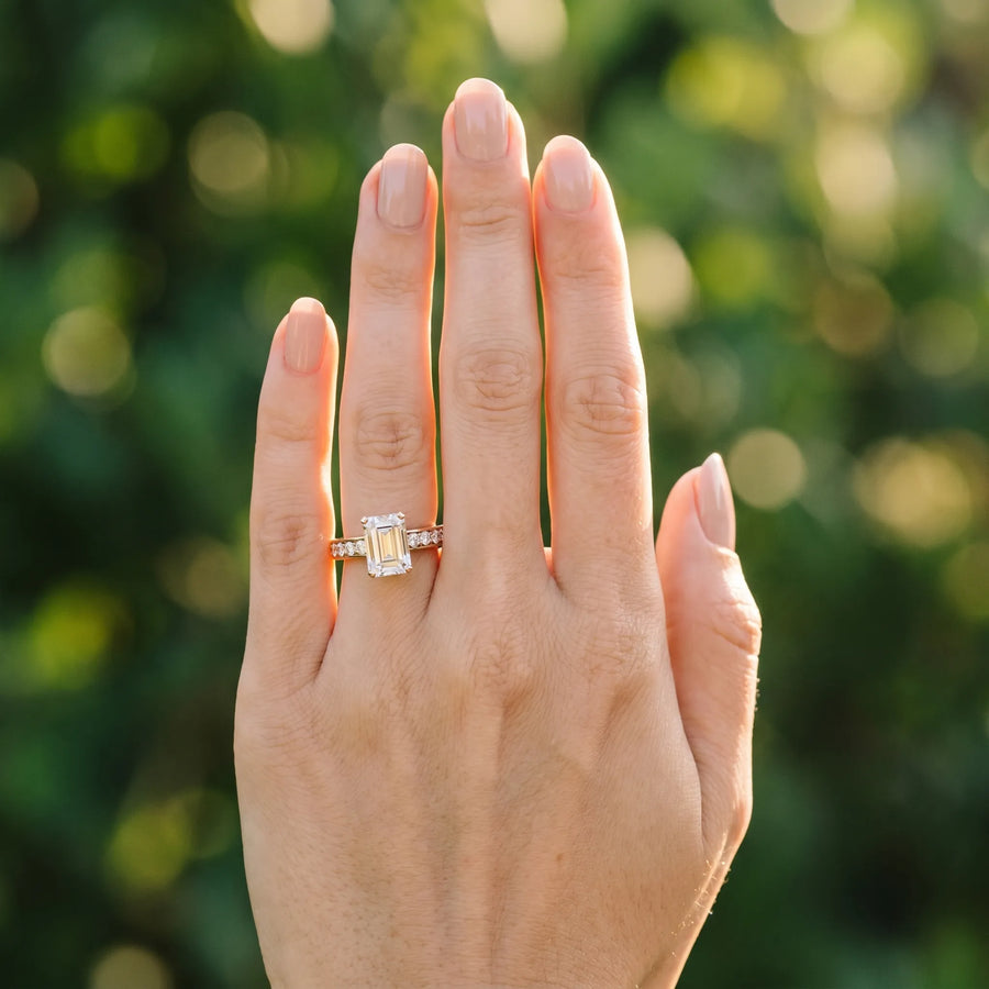 Rose gold Emerald Cut Channel Set Diamond Engagement Ring with Four-Prong Setting