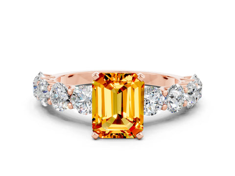 Rose gold Emerald Cut Citrine Prong Setting with Side Stones on a Pave Band