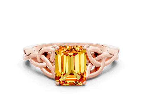 Rose gold Emerald Cut Citrine Solitaire Engagement Ring with Celtic Knot Band and Four-Prong Setting