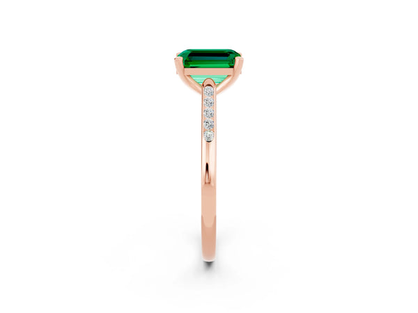 Rose gold Emerald Cut Emerald Solitaire Ring with Channel Set Round  Band and Prong Setting