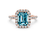 Rose gold Emerald Cut Cut Diamond Floral Halo Engagement Ring with Pavé Band and Prong Setting