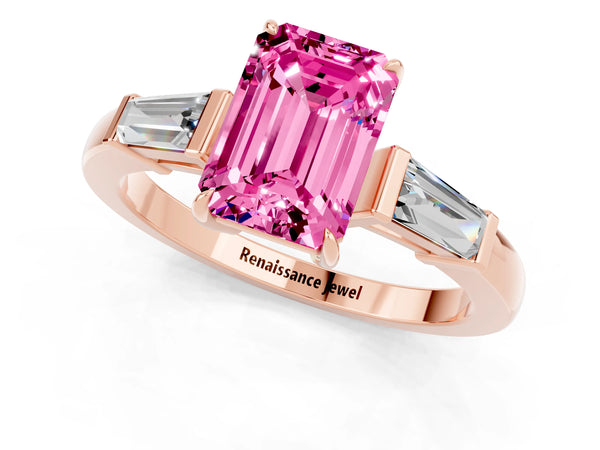 Rose gold Emerald Cut Pink Sapphire Three-Stone Ring with Tapered Baguette Side Stones and Prong Setting