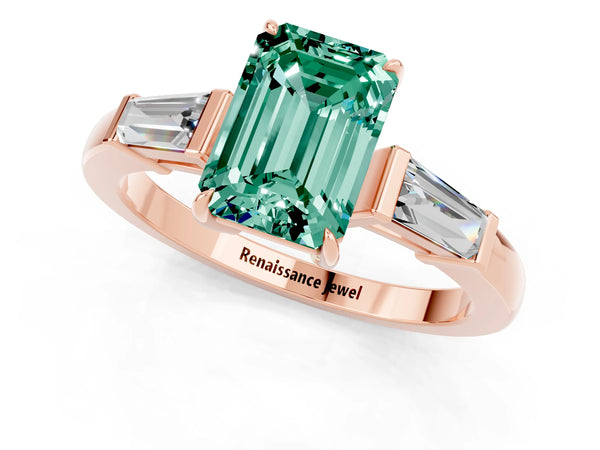 Rose gold Emerald Cut Green Sapphire Three-Stone Ring with Tapered Baguette Side Stones and Prong Setting