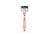 Rose gold Emerald Cut Cut Diamond Ring with Tapered Baguette Side Stones in Four-Prong Setting_2