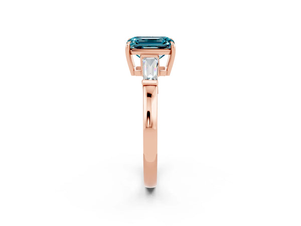 Rose gold Emerald Cut Cut Diamond Ring with Tapered Baguette Side Stones in Four-Prong Setting