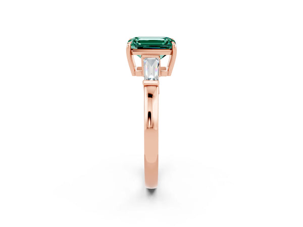 Rose gold Emerald Cut Green Sapphire Three-Stone Ring with Tapered Baguette Side Stones and Prong Setting