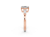 Rose gold Emerald Cut Cut Diamond Ring with Tapered Baguette Side Stones in Four-Prong Setting_2