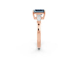 Rose gold Emerald Cut Cut Diamond Ring with Tapered Baguette Side Stones in Four-Prong Setting_2