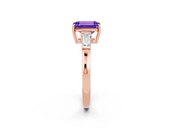 Rose gold Emerald Cut Tanzanite Three-Stone Ring with Tapered Baguette Side Stones and Prong Setting