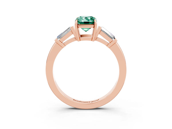 Rose gold Emerald Cut Green Sapphire Three-Stone Ring with Tapered Baguette Side Stones and Prong Setting