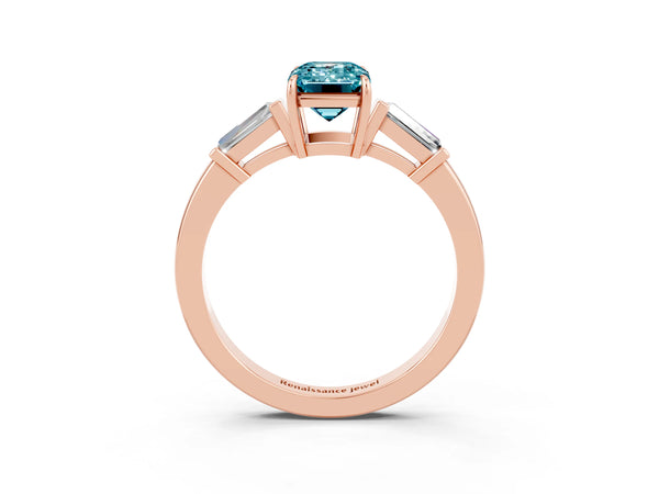 Rose gold Emerald Cut Cut Diamond Ring with Tapered Baguette Side Stones in Four-Prong Setting