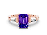 Rose gold Emerald Cut Cut Diamond Ring with Tapered Baguette Side Stones in Four-Prong Setting
