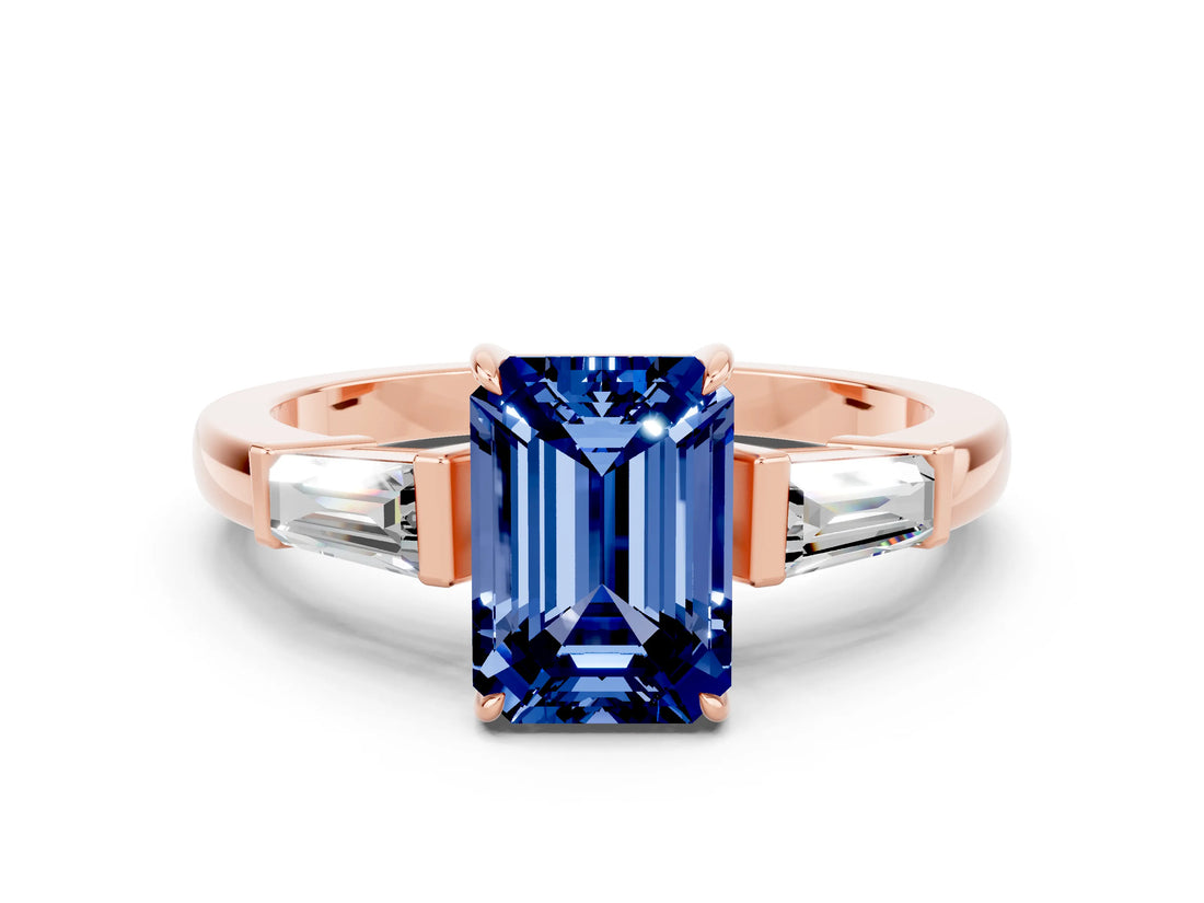 Rose gold Emerald Cut Cut Diamond Ring with Tapered Baguette Side Stones in Four-Prong Setting