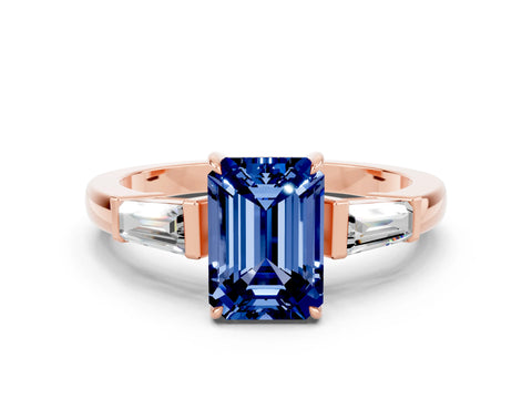 Rose gold Emerald Cut Cut Diamond Ring with Tapered Baguette Side Stones in Four-Prong Setting