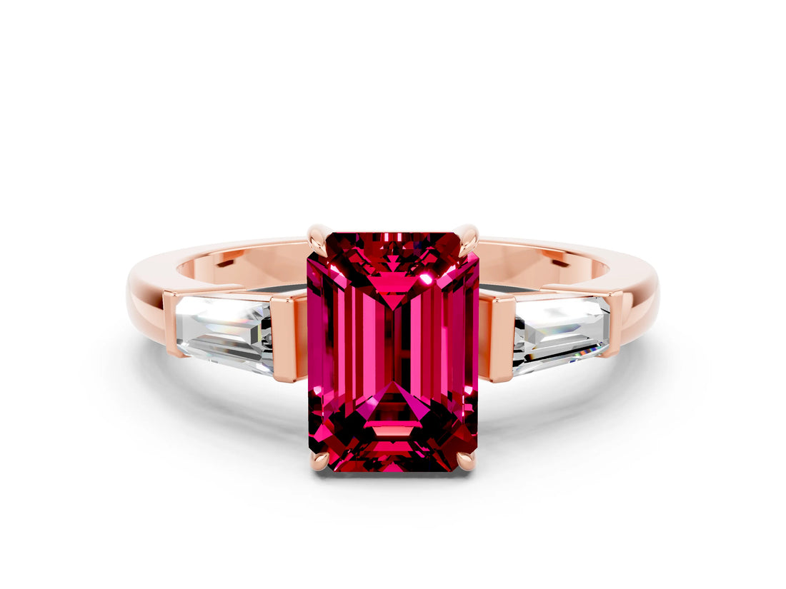 Rose gold Emerald Cut Cut Diamond Ring with Tapered Baguette Side Stones in Four-Prong Setting